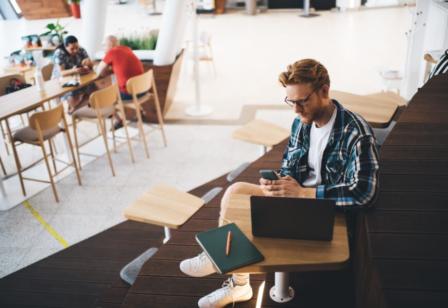 Guy working or studying in coworking office space